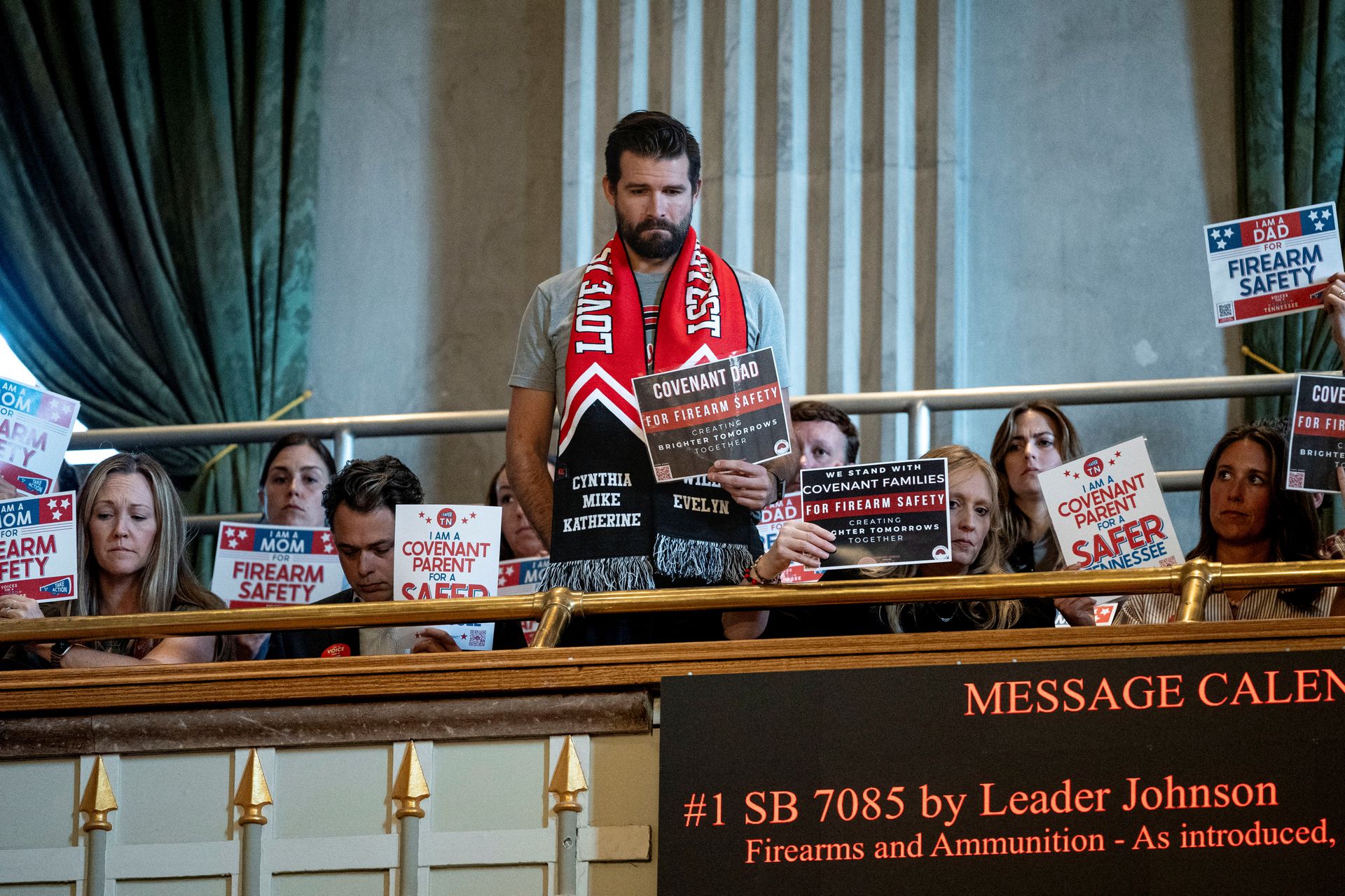 Nick Hansen, a Covenant School dad, in the Senate gallery above the chamber floor advocating for gun law reform